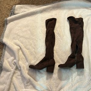Tall brown boots size 8 1/2 with small heel.